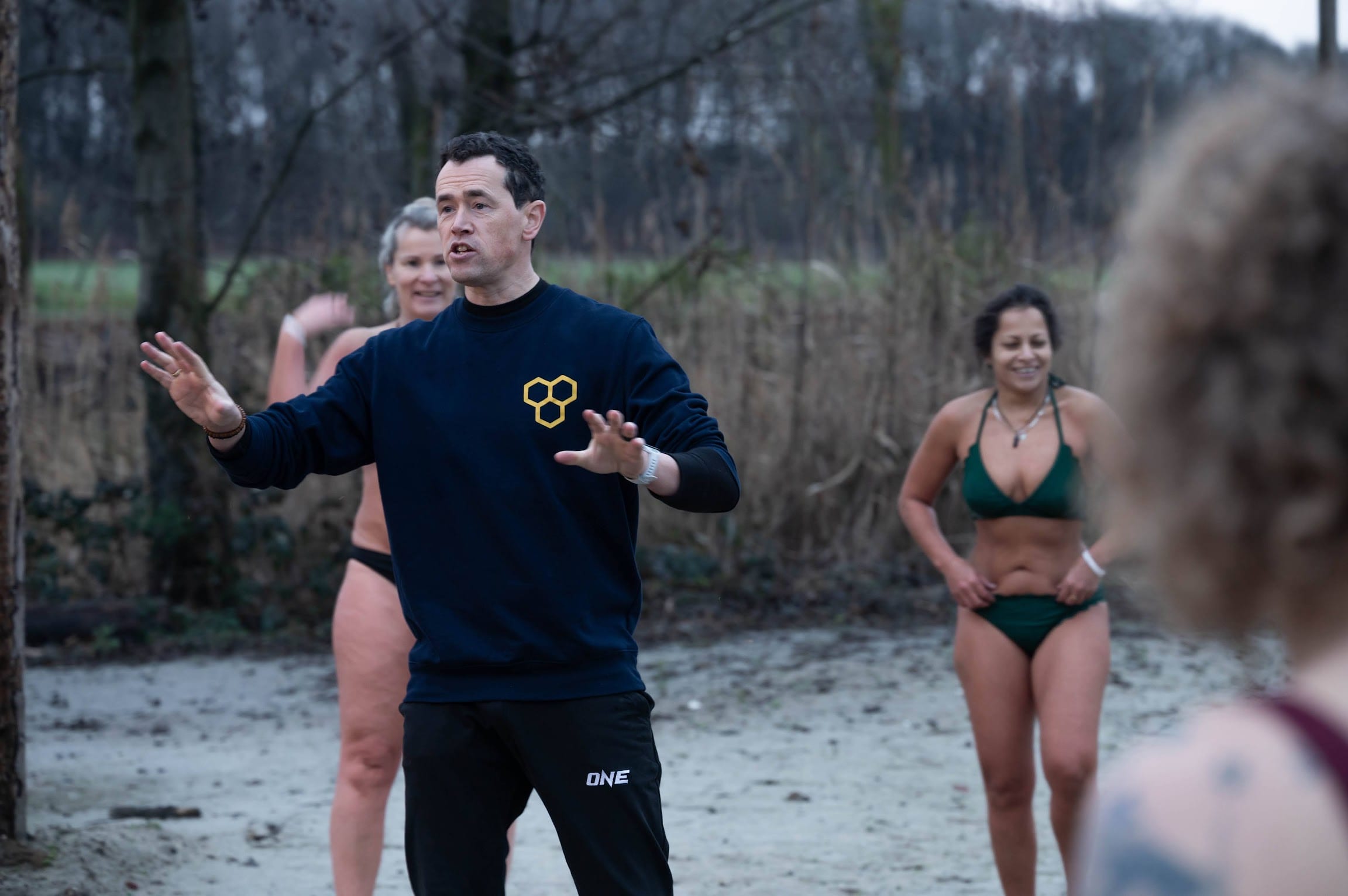 Jan Wiersma instructing outdoors