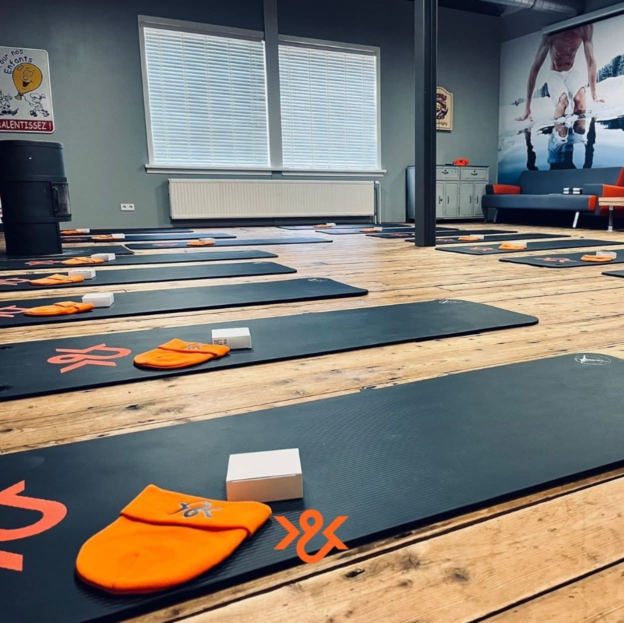 Yoga studio with mats laid out for breathwork